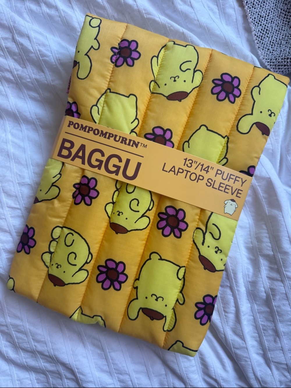 BAGGU Puffy Laptop Sleeve in Yellow with Purple Floral Pompompurin Print